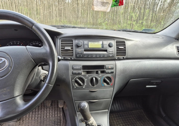 Toyota Corolla cena 7500 przebieg: 311000, rok produkcji 2003 z Strzelce Opolskie małe 121